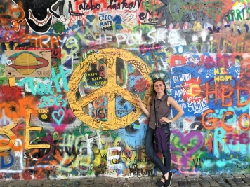 the Lennon wall: I love the graffiti above the peace sign saying "Czech mate"